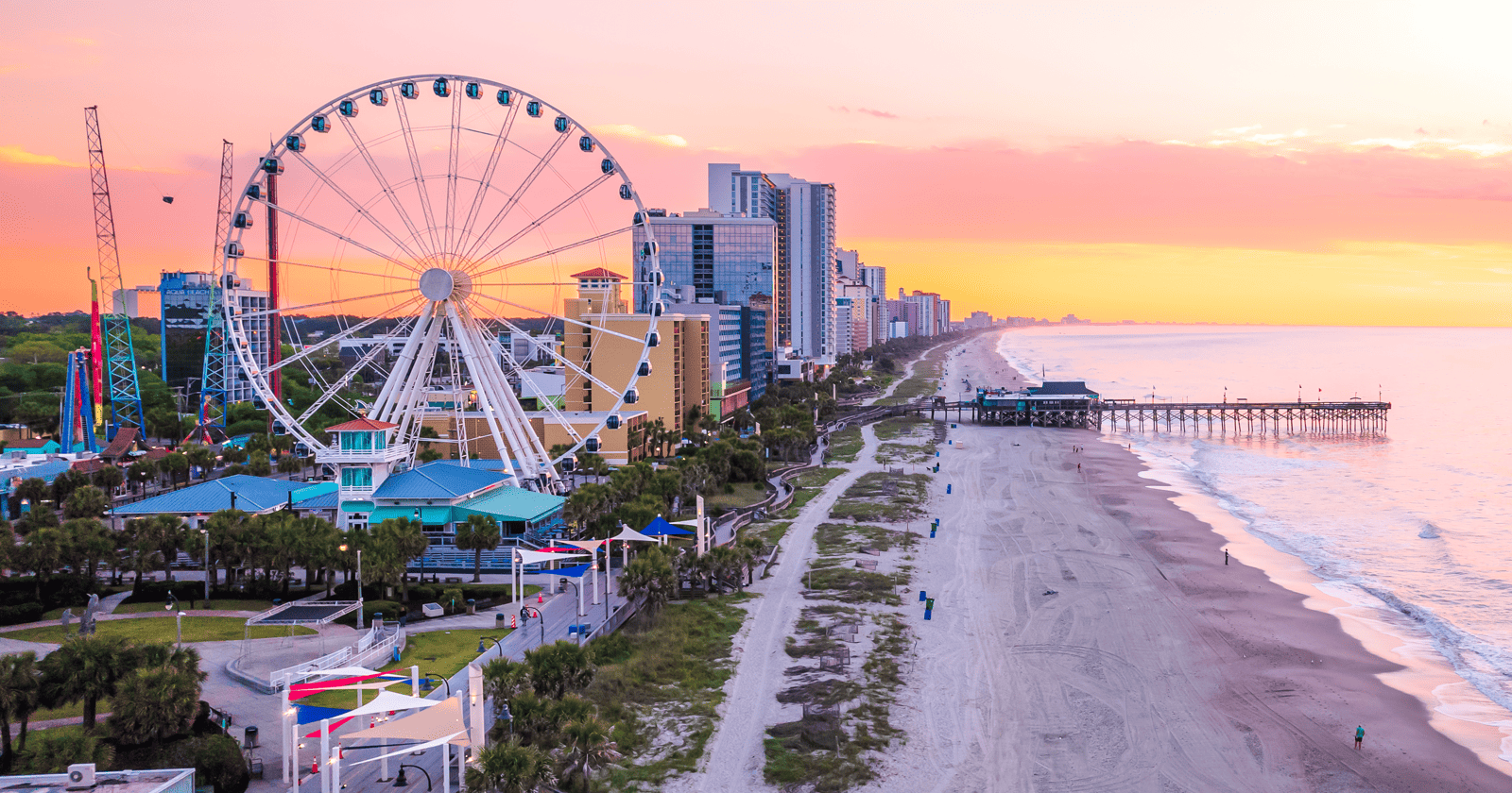 A ferris wheel on a beach in charleston, south carolina.