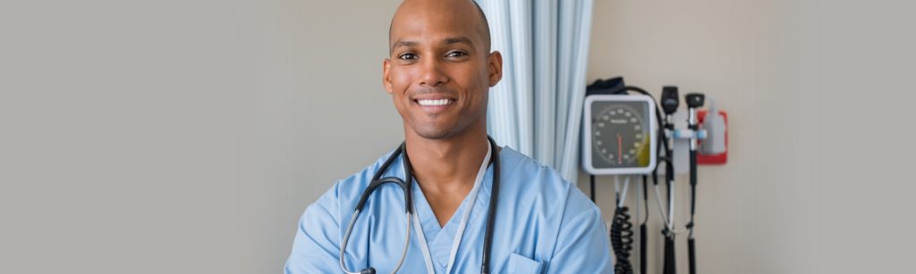 Photo of male nurse posing towards camera