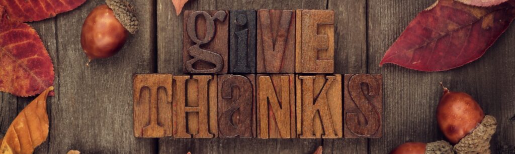 A fall banner image that says "give thanks",
