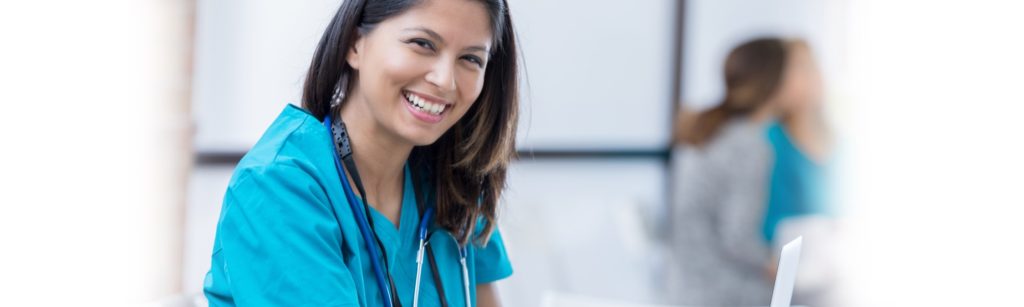 Image of woman nurse smiling towards camera