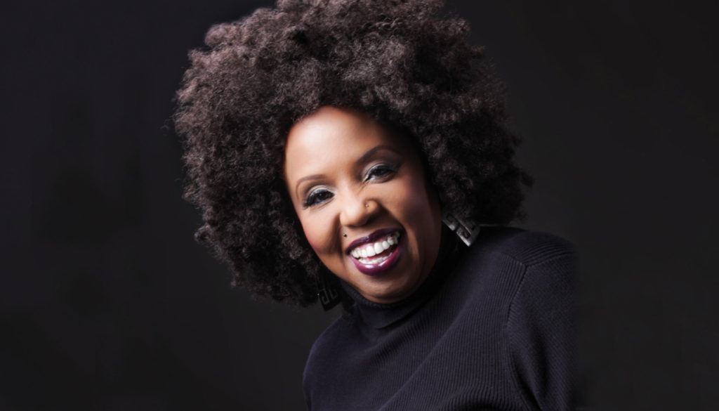 Headshot of Elva, a social worker featured by Supplemental Health Care