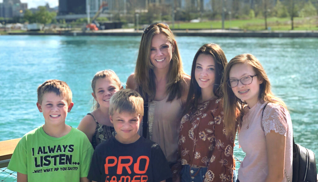 Image: Care More Spotlight: photo of healthcare professional, Kristen F with her family