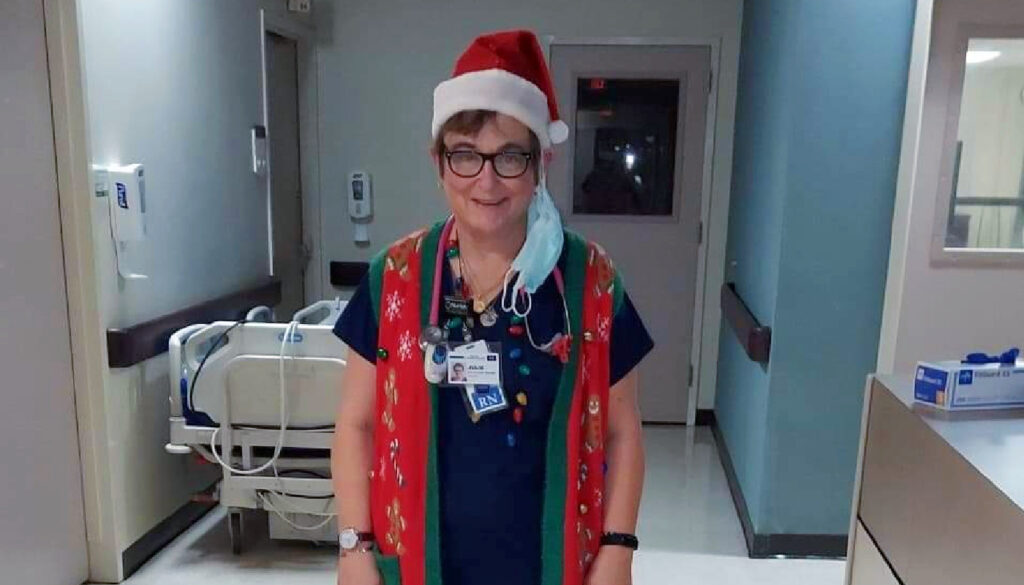 Image: Care More Spotlight: Photo of nurse Julie in her scrubs and holiday wear.