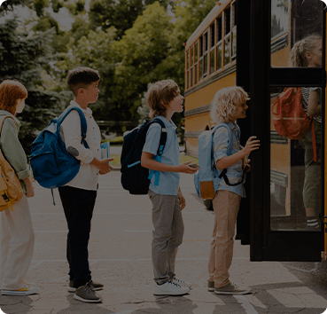 image of children entering school bus