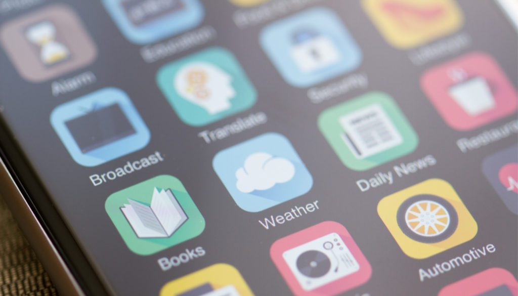 A close image of a smartphone and its various apps