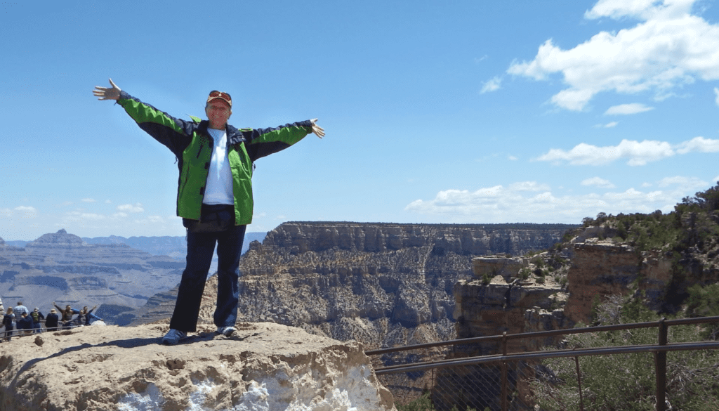 Image: woman posing in front of grand canyon
