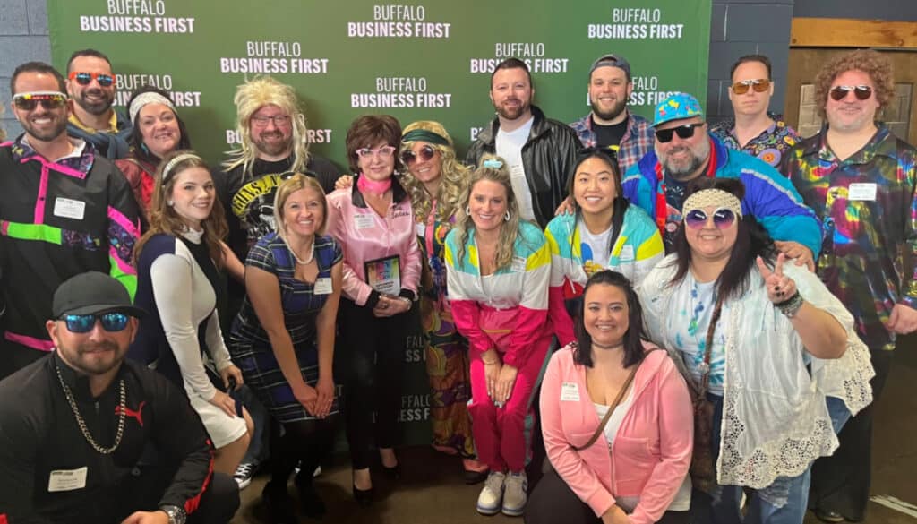 An image of a group of SHC workers posing as they win Buffalo Business First's 2023 best places to work