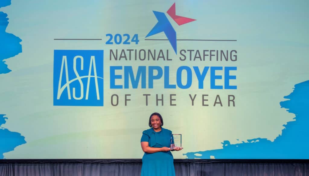 Dr Kelly Byrd accpeting ASA's National Staffing Employee of the Year award 2024 at Staffing World