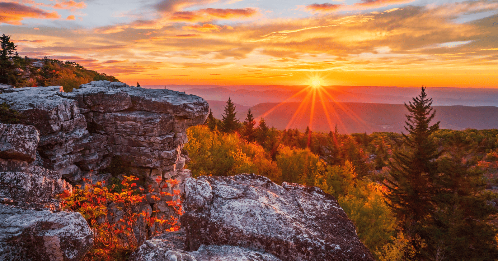 A sunset over a mountain.
