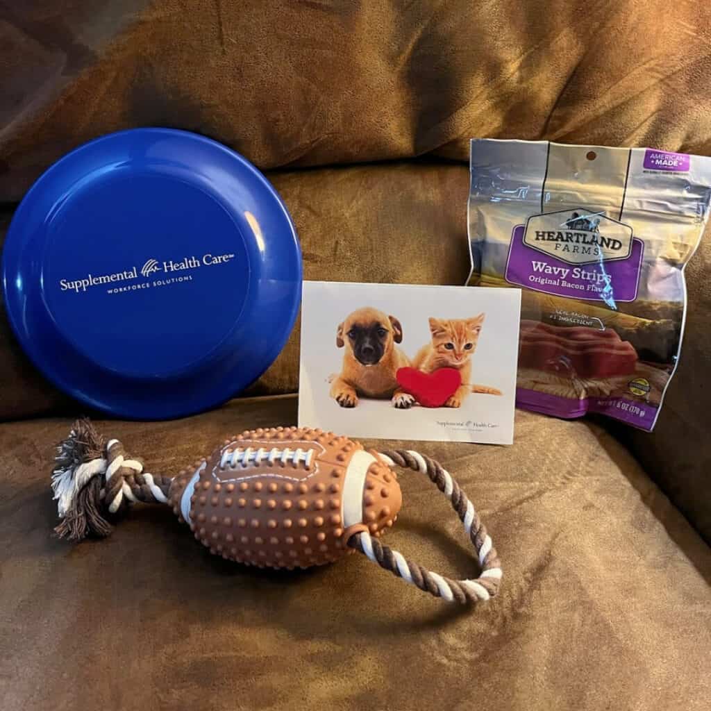 Supplemental Health Care frisbee and a dog treats and toy.