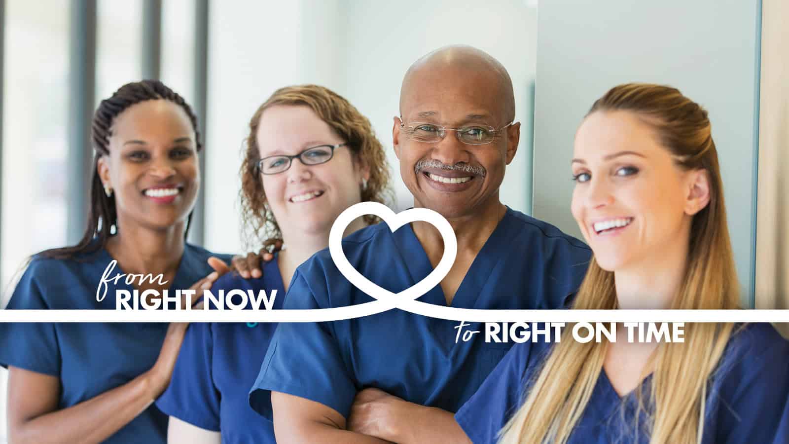 A diverse group of medical professionals smiling, with a female doctor in the foreground.
