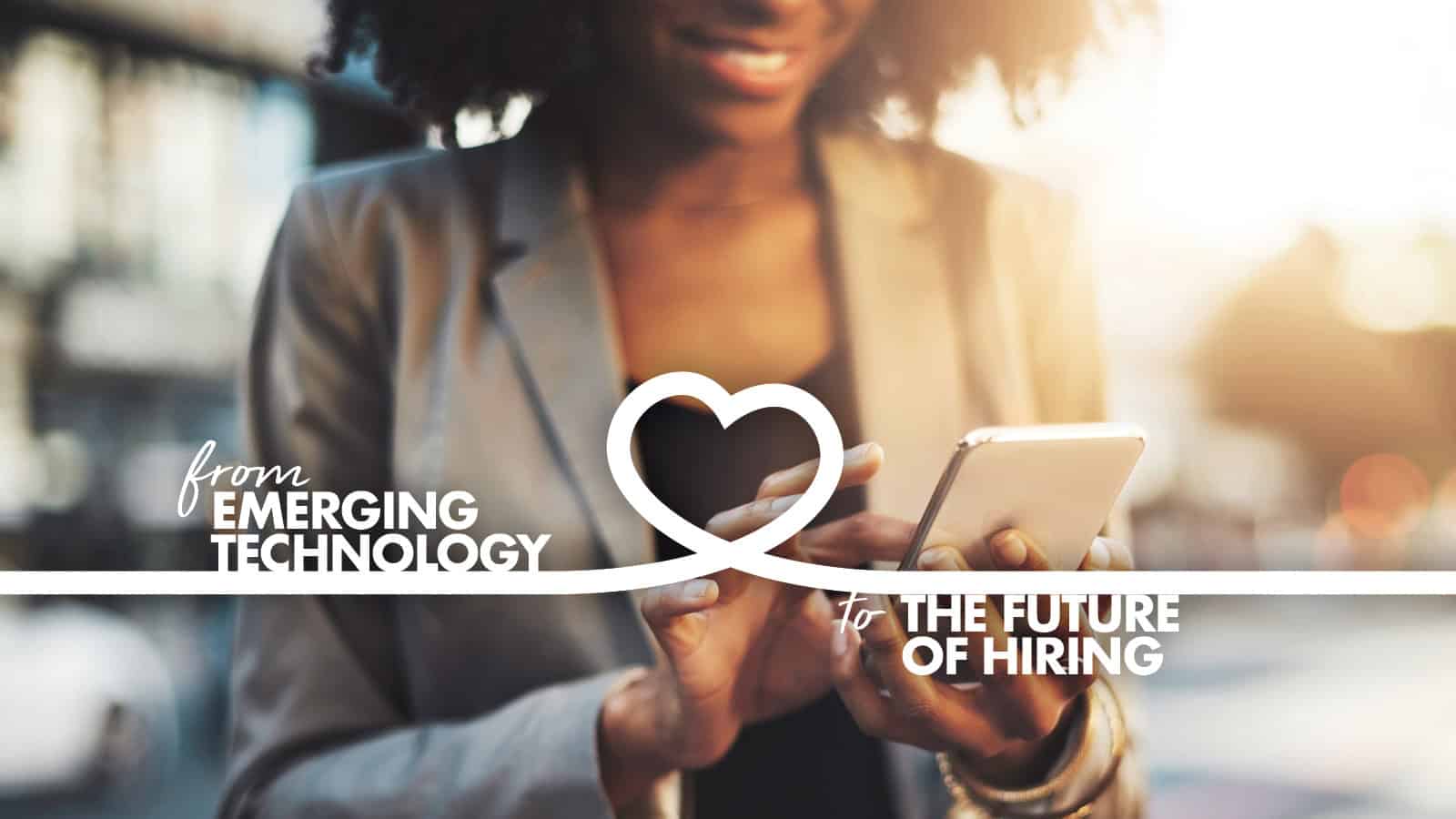 African american woman using a smartphone with graphics about technology and hiring visible in the foreground.